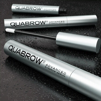QUABROW Eyebrow Serum DUO SET displayed on wet dark surface with open applicator and water droplets