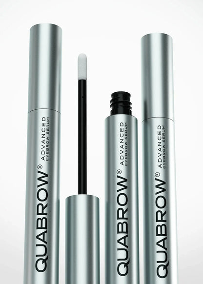 Close-up of QUABROW Trio Set showing three serum tubes with visible soft applicator tips
